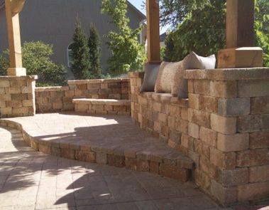 Landscaping In Raymore MO Stone Patio With Seating Area